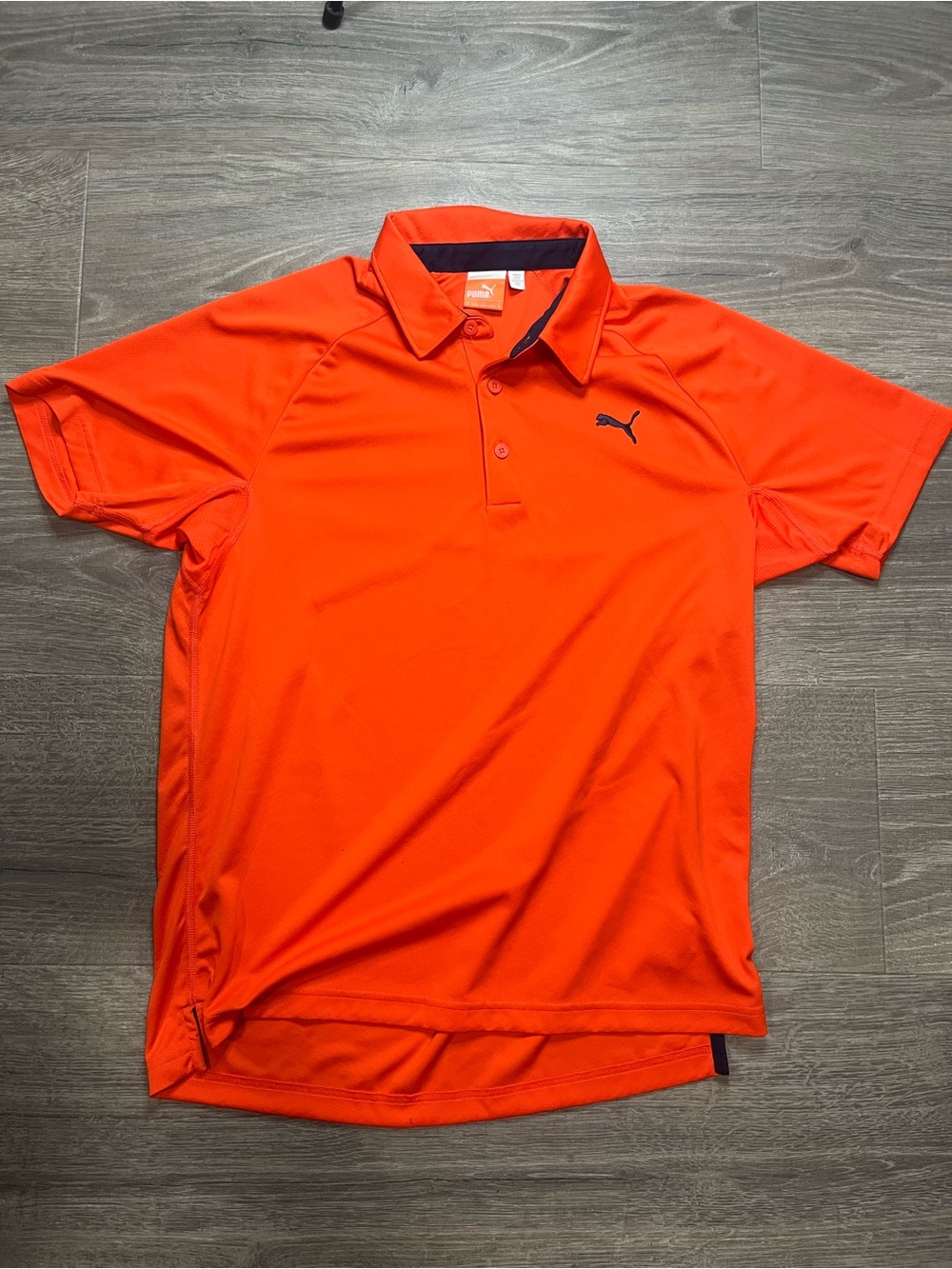 Puma Men’s Bright Orange Short-Sleeve Polo with Black Logo